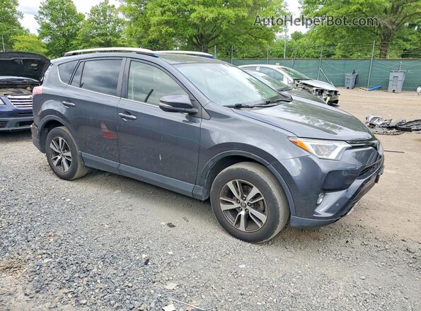 JTMRFREV3GD184321 2016 TOYOTA RAV4 Gray Front right