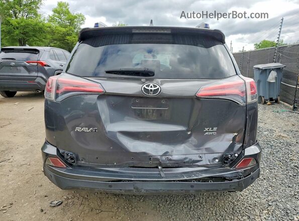 JTMRFREV3GD184321 2016 TOYOTA RAV4 Gray Rear view