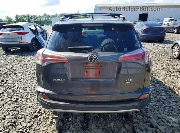 JTMRFREV4GJ097688 2016 TOYOTA RAV4 Gray Widok z tyłu