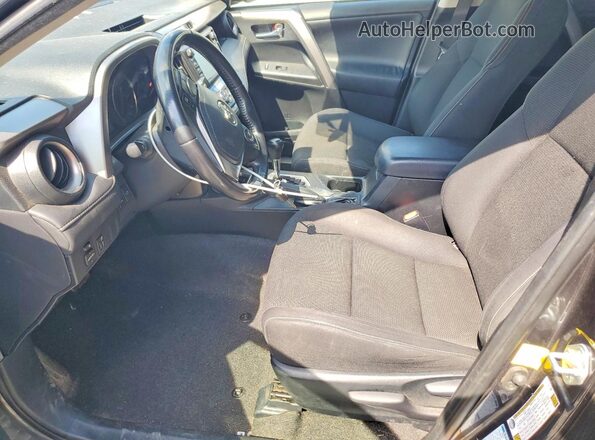 JTMRFREV4GJ097688 2016 TOYOTA RAV4 Gray Widok wnętrza z przodu