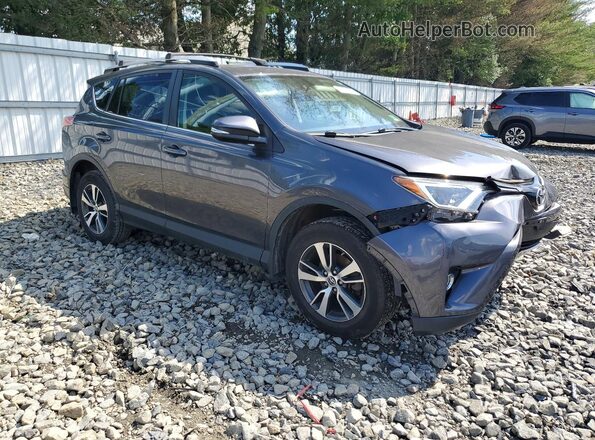 JTMRFREV4GJ097688 2016 TOYOTA RAV4 Gray Przód prawy