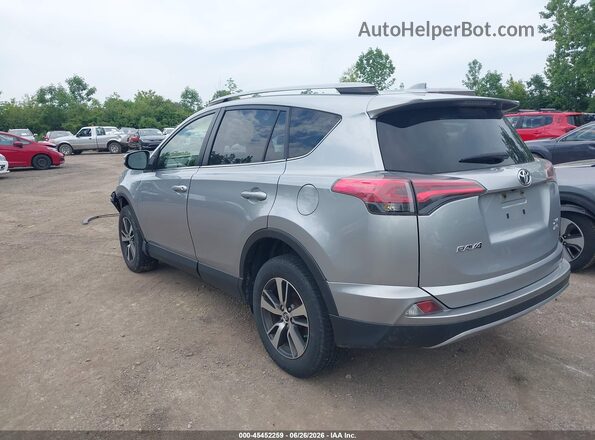 JTMRFREV4JJ216749 2018 TOYOTA RAV4 Серебряный Задняя левая четверть