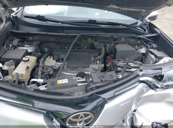 JTMRFREV4JJ216749 2018 TOYOTA RAV4 Серебряный Вид сзади