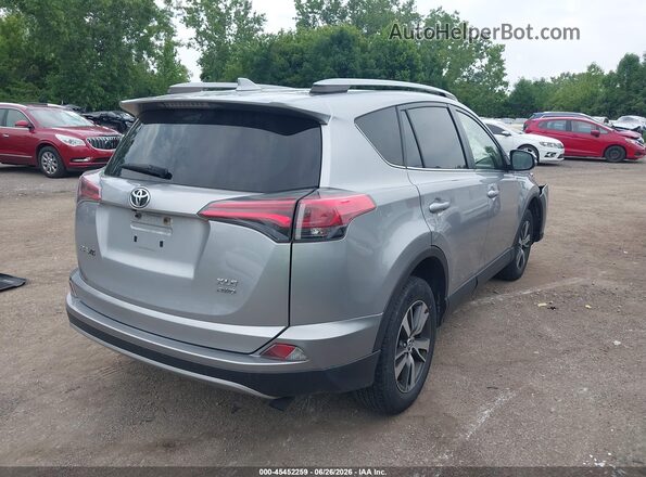 JTMRFREV4JJ216749 2018 TOYOTA RAV4 Серебряный Задняя правая четверть