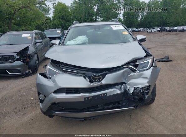 JTMRFREV4JJ216749 2018 TOYOTA RAV4 Серебряный Вид щитка приборов