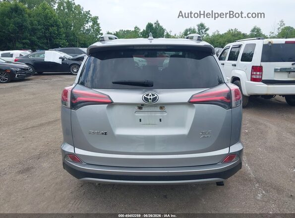 JTMRFREV4JJ216749 2018 TOYOTA RAV4 Серебряный 