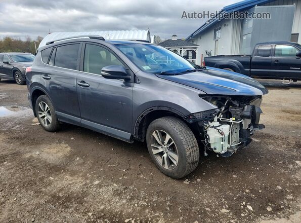 JTMRFREV4JJ252490 2018 TOYOTA RAV4 Gray Передня права чверть