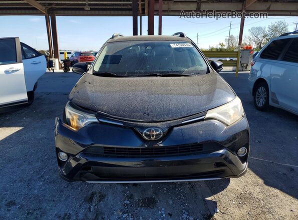 JTMRFREV4JJ727023 2018 TOYOTA RAV4 Blue Вид спереду