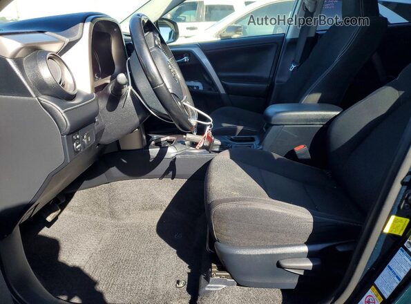 JTMRFREV4JJ727023 2018 TOYOTA RAV4 Blue Вид салону спереду