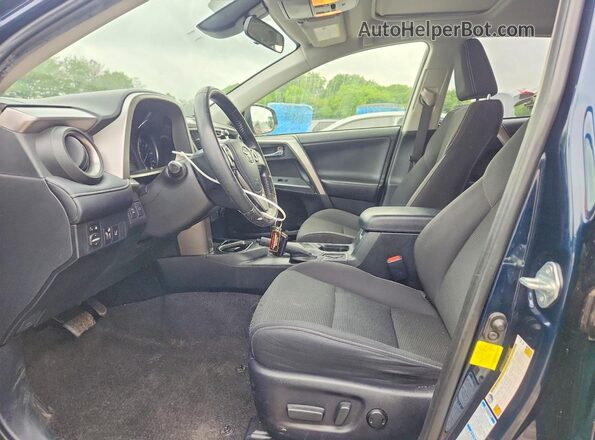 JTMRFREV4JJ730567 2018 TOYOTA RAV4 Blue Widok wnętrza z przodu