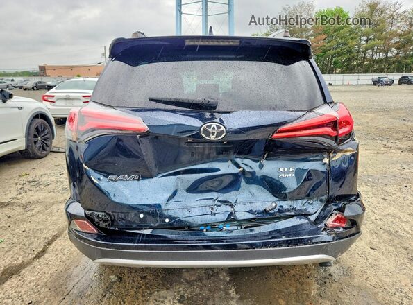JTMRFREV4JJ730567 2018 TOYOTA RAV4 Blue Widok z tyłu