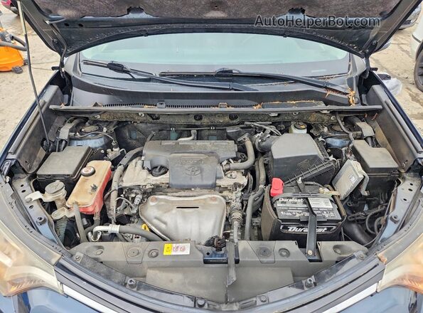 JTMRFREV4JJ730567 2018 TOYOTA RAV4 Blue Widok wnętrza z tyłu