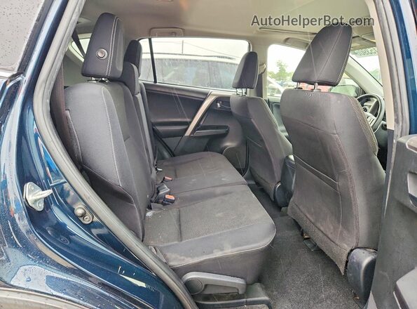 JTMRFREV4JJ730567 2018 TOYOTA RAV4 Blue Widok tylnych siedzeń