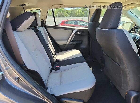 JTMRFREV5HD206840 2017 TOYOTA RAV4 Gray Rear interior view