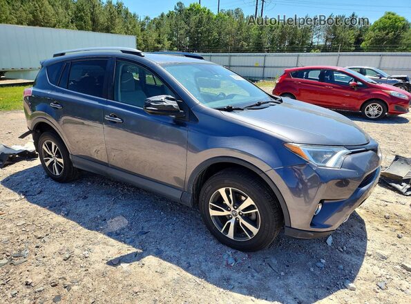 JTMRFREV5HD206840 2017 TOYOTA RAV4 Gray Front right