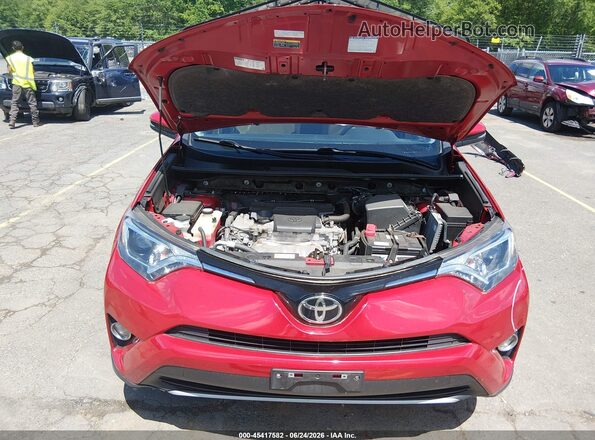 JTMRFREV6HJ145581 2017 TOYOTA RAV4 Red Vista trasera