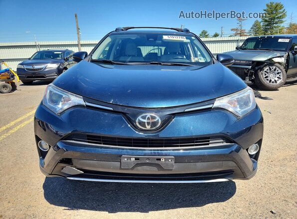 JTMRFREV6JJ725323 2018 TOYOTA RAV4 Blue წინა ხედი