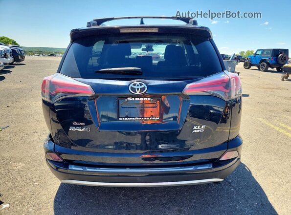 JTMRFREV6JJ725323 2018 TOYOTA RAV4 Blue უკანა ხედი