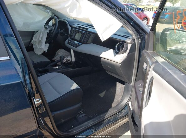 JTMRFREV6JJ733261 2018 TOYOTA RAV4 Blue წინა სალონის ხედი
