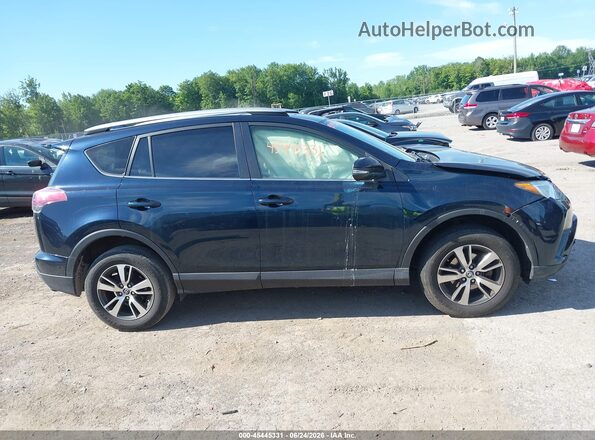 JTMRFREV6JJ733261 2018 TOYOTA RAV4 Blue უკანა სალონის ხედი