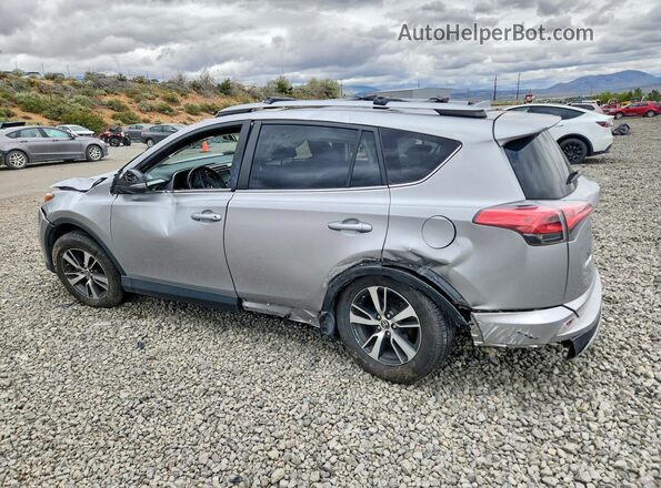 JTMRFREV7JJ199588 2018 TOYOTA RAV4 Silver Հետևի ձախ