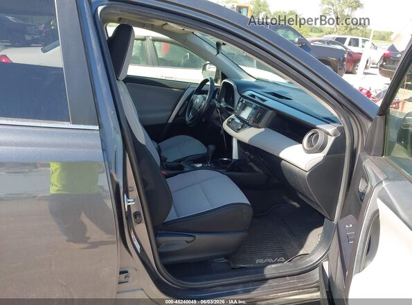 JTMRFREV8HD203429 2017 TOYOTA RAV4 Gray Vista interior delantera
