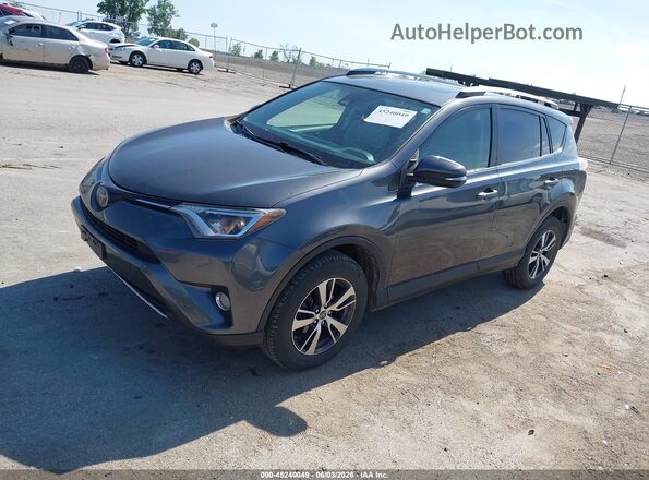 JTMRFREV8HD203429 2017 TOYOTA RAV4 Gray Vista tres cuartos delantera izquierda