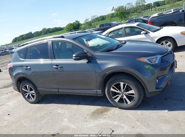 JTMRFREV8HD203429 2017 TOYOTA RAV4 Gray Vista interior trasera
