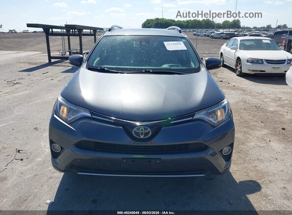 JTMRFREV8HD203429 2017 TOYOTA RAV4 Gray Vista del cuadro de instrumentos