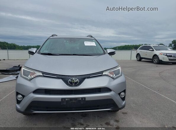 JTMRFREV8JJ238303 2018 TOYOTA RAV4 Silver Սալոնի հետևի տեսք