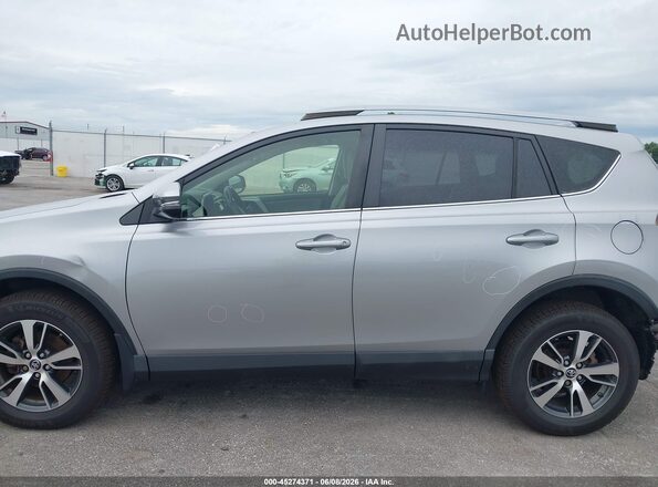 JTMRFREV8JJ238303 2018 TOYOTA RAV4 Silver 