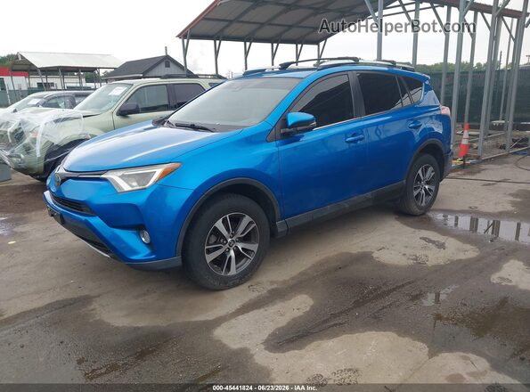 JTMRFREV9GJ076349 2016 TOYOTA RAV4 Light Blue Передня ліва чверть