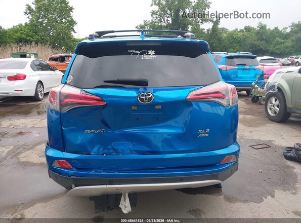 JTMRFREV9GJ076349 2016 TOYOTA RAV4 Light Blue Вид спереду