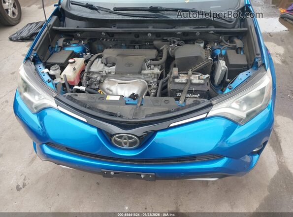 JTMRFREV9GJ076349 2016 TOYOTA RAV4 Light Blue Вид ззаду