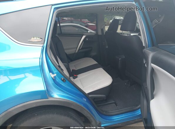 JTMRFREV9GJ076349 2016 TOYOTA RAV4 Light Blue Вид наклейки з VIN-кодом