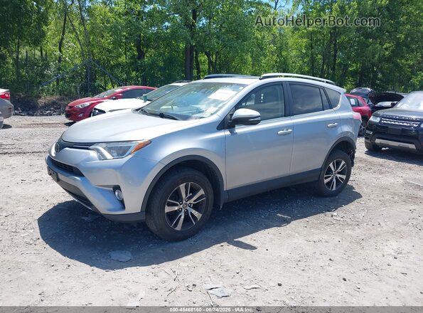 JTMRFREV9JD246957 2018 TOYOTA RAV4 Silver Առջևի ձախ երեք քառորդ տեսարան