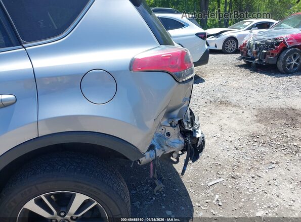JTMRFREV9JD246957 2018 TOYOTA RAV4 Silver Դիմացի տեսք