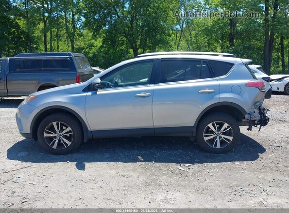 JTMRFREV9JD246957 2018 TOYOTA RAV4 Silver Սալոնի 360 աստիճան տեսք