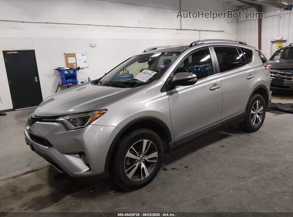 JTMRFREV9JD257828 2018 TOYOTA RAV4 Silver წინა მარცხენა ხედი სამი მეოთხედიდან