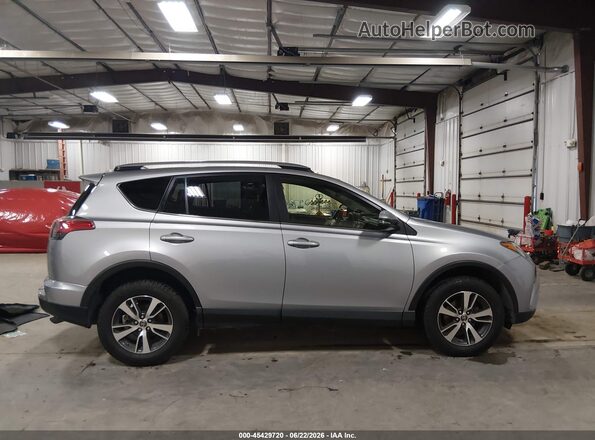 JTMRFREV9JD257828 2018 TOYOTA RAV4 Silver უკანა სალონის ხედი