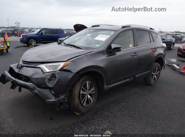 JTMRFREVXHJ702749 2017 TOYOTA RAV4 Gray Передня ліва чверть