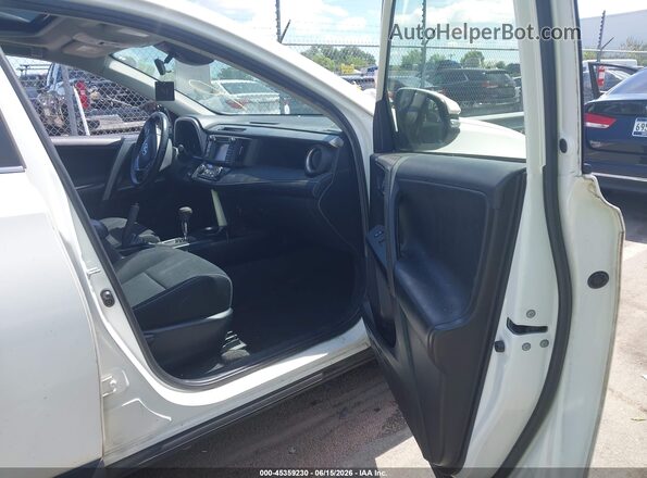 JTMRFREVXHJ704436 2017 TOYOTA RAV4 White Front interior view