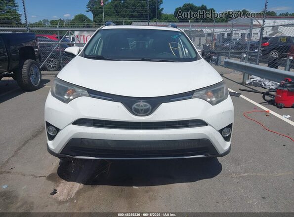 JTMRFREVXHJ704436 2017 TOYOTA RAV4 White Dashboard view