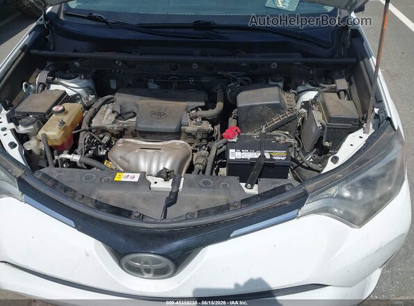 JTMRFREVXHJ704436 2017 TOYOTA RAV4 White Rear view