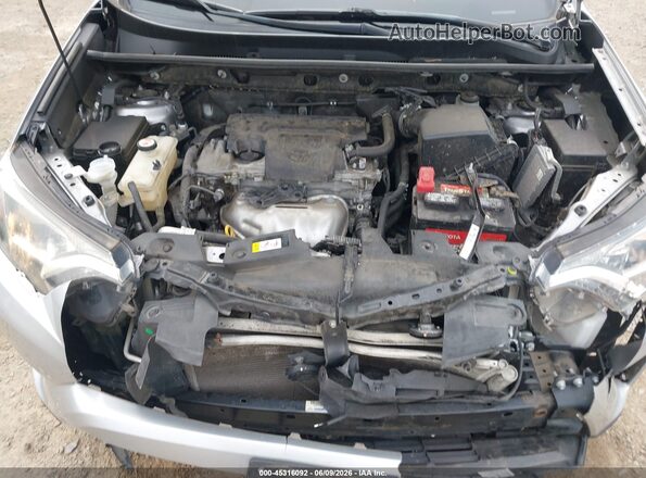 JTMRFREVXJJ227108 2018 TOYOTA RAV4 Silver Вид ззаду