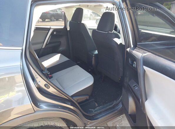 JTMRFREVXJJ725485 2018 TOYOTA RAV4 Gray Vista de la etiqueta del VIN