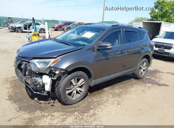 JTMRFREVXJJ725485 2018 TOYOTA RAV4 Gray Vista tres cuartos delantera izquierda