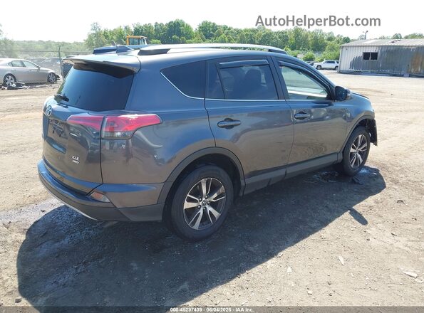 JTMRFREVXJJ725485 2018 TOYOTA RAV4 Gray Trasero derecho
