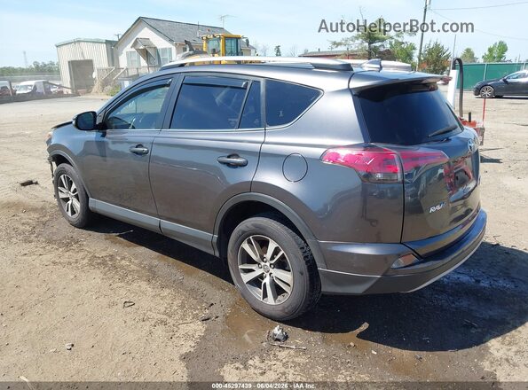 JTMRFREVXJJ725485 2018 TOYOTA RAV4 Gray Trasero izquierdo
