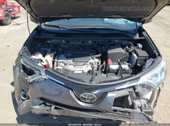 JTMRFREVXJJ725485 2018 TOYOTA RAV4 Gray Vista trasera